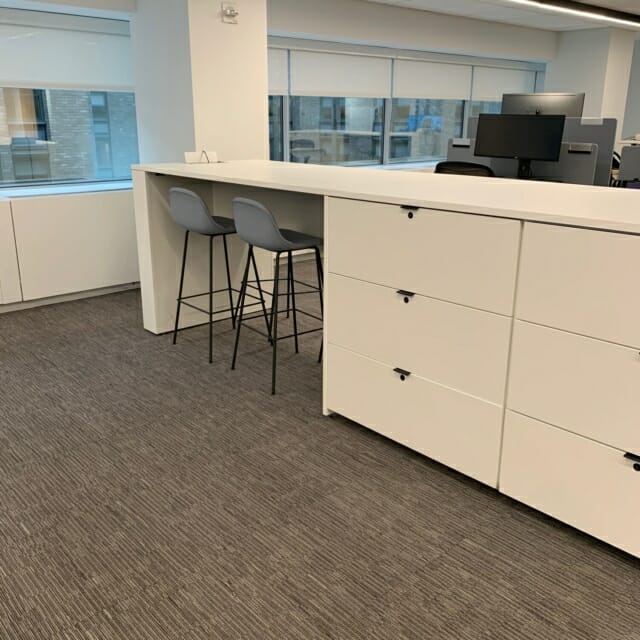 Custom Island Design in Workplace Office for Storage and Collaboration