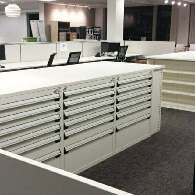 Custom Islands with Rousseau Drawers for Storage